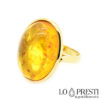 anello-con-ambra-naturale- color miele-oro-18kt
