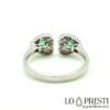 ring with heart-cut emeralds and brilliant diamonds in 18kt white gold