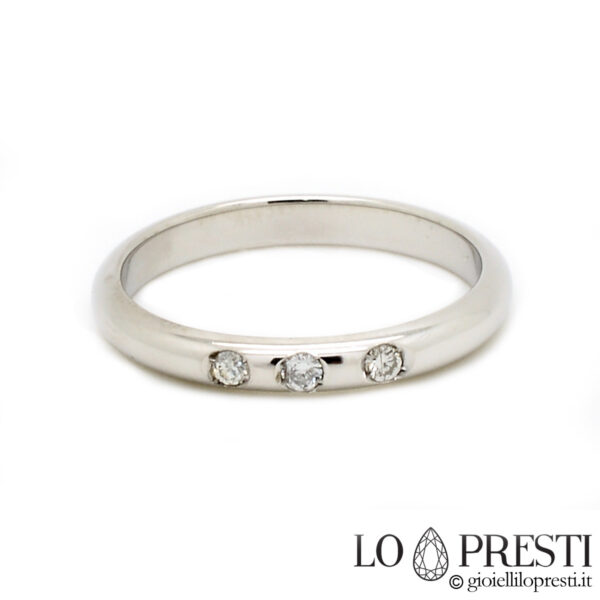 anillo trilogía con diamantes brillantes para hombre y mujer en oro blanco de 18kt