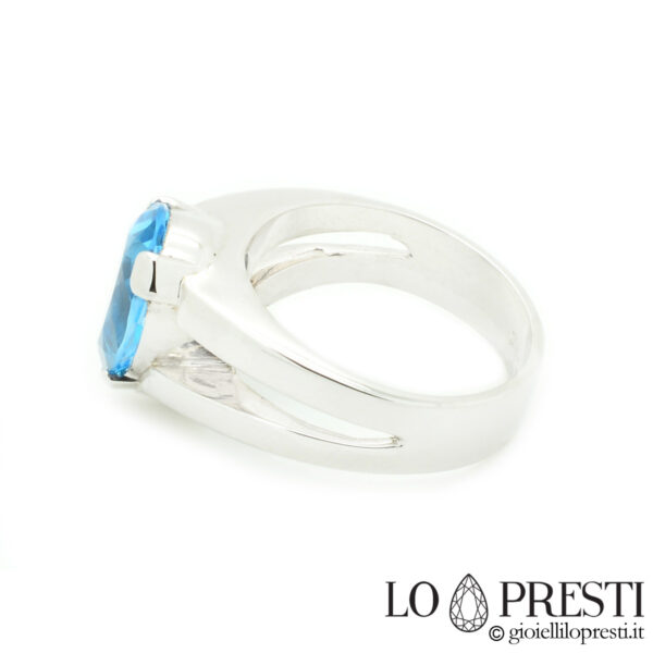 ring-with-blue-topaz-pear-cut-white-gold