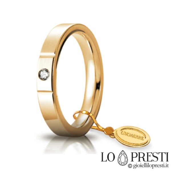 Unoaerre yellow gold wedding ring with diamond ct.0.05 gr.7 mm.3.50
