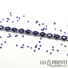 tennis bracelet with blue sapphires, white gold diamonds
