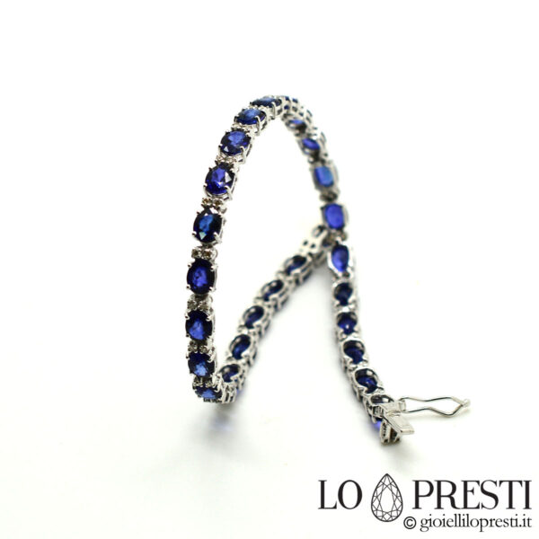 Tennis bangle with blue sapphires and brilliant diamonds