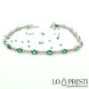 tennis bracelet with emeralds and diamonds in 18kt white gold