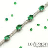 18kt white gold tennis bracelet with certified emeralds and diamonds
