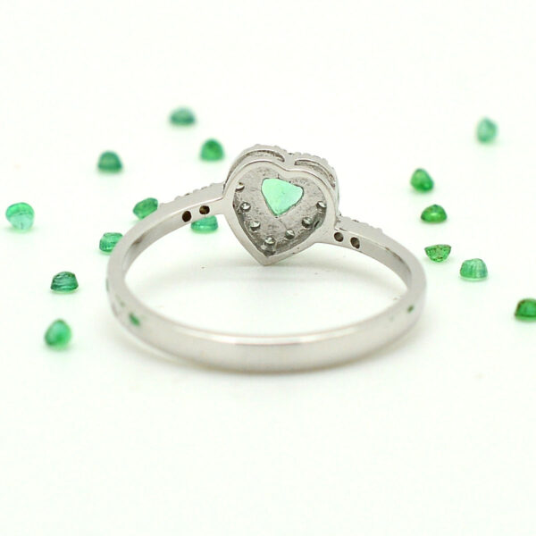 white gold heart rings with brilliant diamonds and emeralds