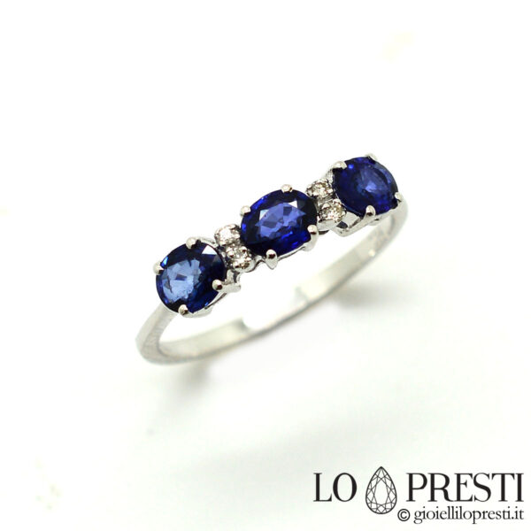 trilogy ring with sapphires and diamonds in white gold