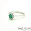 18kt white gold ring with emerald, emeralds and brilliant diamonds
