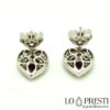 heart-shaped earrings with brilliant diamonds and rubies in 18kt white gold
