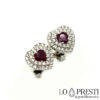 white gold heart-shaped earrings with rubies and diamonds