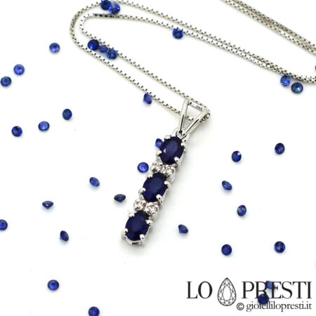 Halskette-Anhänger-Trilogie-blaue-Saphire-Diamanten-18kt-Weißgold