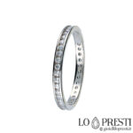 track ring with white zircons in 18 kt white gold