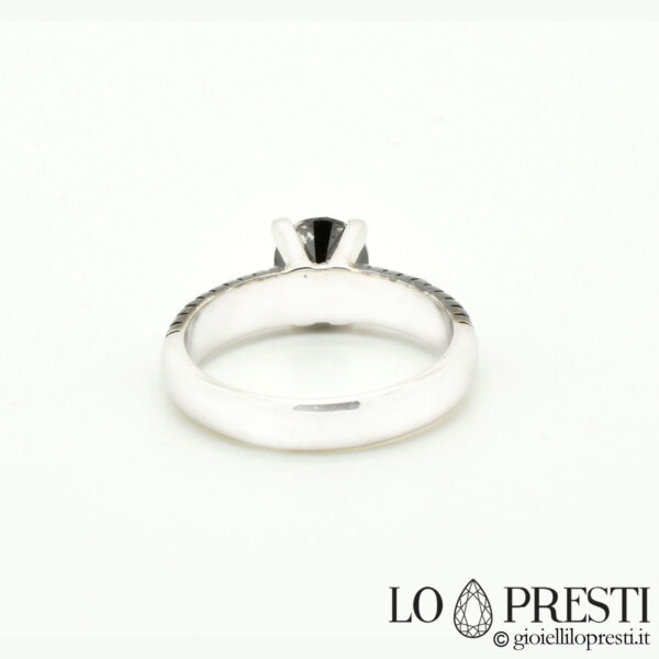 18kt white gold solitaire ring with black diamond shank with brilliant white gold diamonds