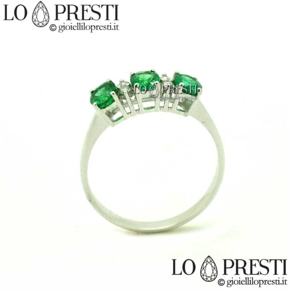 trilogy ring with emeralds, emeralds, diamonds, 18kt white gold
