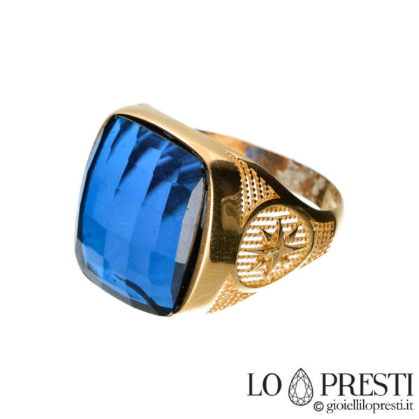 Men's gold chevalier pinky shield ring with blue zircon stone