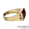 18kt yellow gold men's ring with red zircon