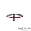 anillo cruz con circonitas rojas oro blanco 18kt