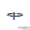 cross ring with red zircons 18kt white gold