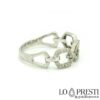 Zusammengesetzter Ring aus 18-karätigem Weißgold mit Diamanten im Brillantschliff, besonders, elegant und raffiniert.