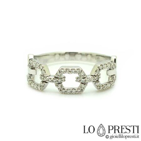 Anel articulado em ouro branco 18kt com diamantes em lapidação brilhante, particular, elegante e refinado.