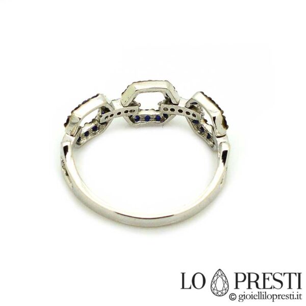 Jointed ring in 18kt white gold with natural and certified sapphires and brilliant-cut diamonds. Elegant, particular and refined.