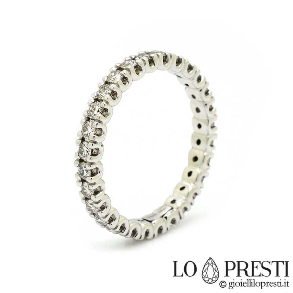 Eternity ring in 18kt white gold with brilliant cut diamonds around the entire band, available on request with different carats.