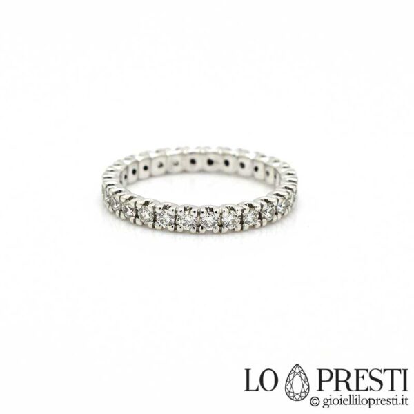 Anello eternity in oro bianco 18kt con diamanti taglio brillate a giro per tutta la veretta,disponibile su richiesta con diverse carature.