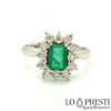 Ring with natural emerald and certified brilliant cut diamonds. A timeless jewelery classic.