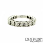 Anello fedina veretta in oro bianco 18kt con diamanti montatura particolare che risalta al meglio le pietre preziose,tendenza moda.