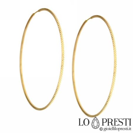 Yellow gold hoops, snow model, concealed clasp, hammered