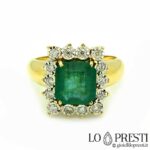 ring with emerald gemologically certified IGI brilliant cut diamonds, handcrafted product.