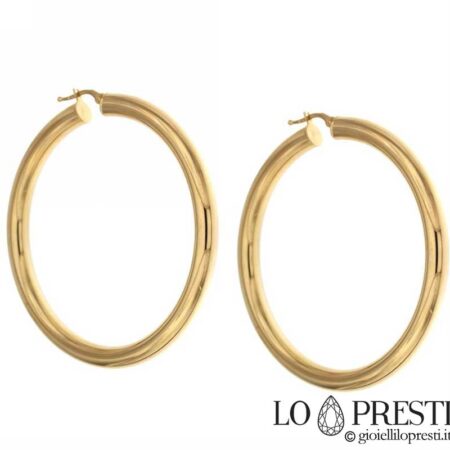 Polished circle bushes in 18kt yellow gold