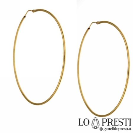 Large polished hoop bushes in 18kt yellow gold