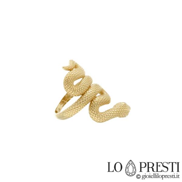 Snake ring in 18kt yellow gold with eyes and green stones, refined workmanship for this design object