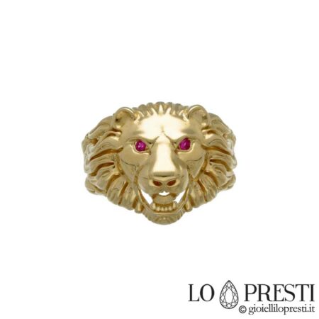 Anillo con cabeza de león en oro amarillo de 18kt con piedras rojas en los ojos, símbolo de fuerza