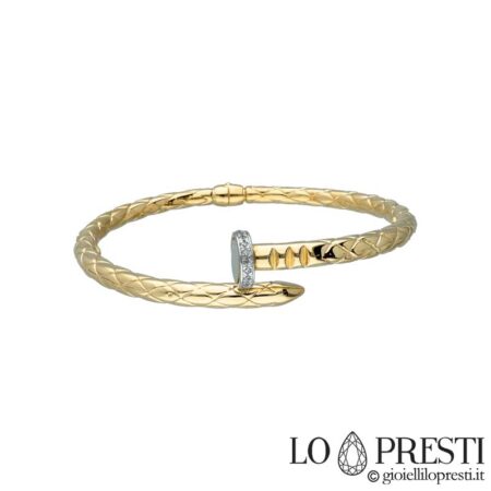 Nail bracelet in 18kt gold and zircons