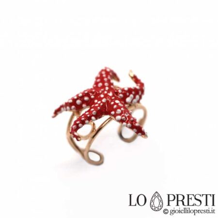 Starfish wave polka dot ring in yellow gold plated and hand enamelled 925 sterling silver, adjustable size. Certificate of guarantee and gift box.