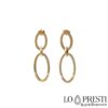 Women's pendant earrings in 18kt yellow gold, polished workmanship, pressure closure, elegant and refined. Warranty certificate and gift box.