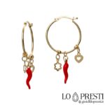 yellow gold hoop earrings with coral horn charms