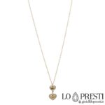 Heart necklace and pendant in 18kt white and yellow gold