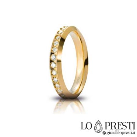 Unoaerre Venus model wedding ring in 18kt white or yellow gold with natural brilliant cut diamonds, suitable for engagement, anniversary or wedding. Certificate of guarantee and gift box.