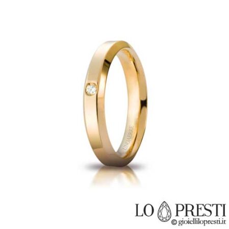 Обручальное кольцо Unaerre Hydra из белого или желтого золота 18 карат с бриллиантом, индивидуализация с помощью внутренней гравировки.