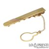 Customizable three-color 18 kt gold tie clip accessory for men. Warranty certificate and gift box.