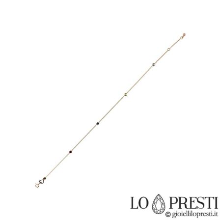 Fancy anklet in 18kt yellow gold with colored zircons. Warranty certificate and gift box.