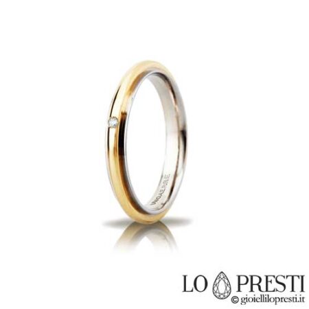 Unaerre Andromeda slim model wedding ring in 18 kt white and yellow gold with brilliant cut diamond, customizable via internal engraving