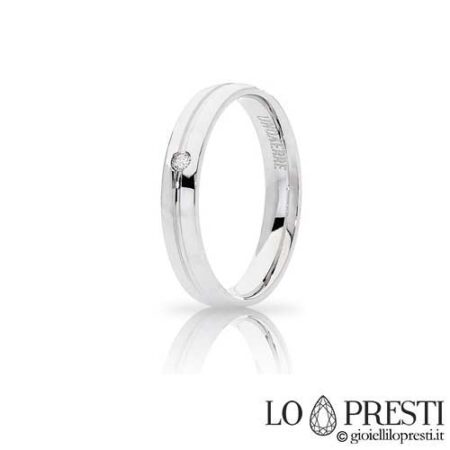 Unoaerre Lyra model wedding ring in 18kt white, yellow or rose gold with brilliant cut diamond, suitable for engagement, anniversary or wedding. Certificate of guarantee and gift box.