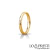 Unaerre Orion slim model wedding ring in 18 kt yellow gold with diamond, customizable via internal engraving. Product available only on order. Warranty certificate and gift box.