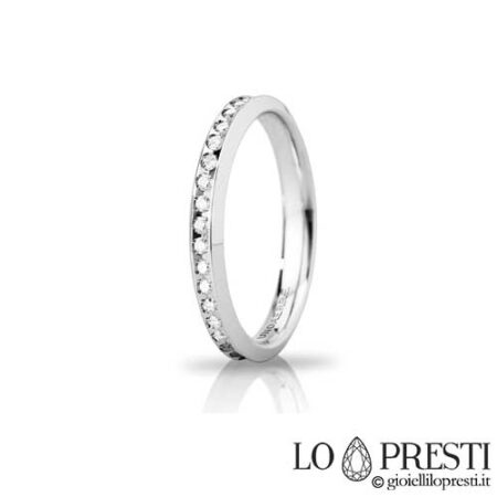 Unoaerre 結婚指輪 スリム ヴィーナス モデルは 18K ホワイトまたはイエロー ゴールド、0.35 カラットのブリリアント カットの天然ダイヤモンドを使用しており、婚約、記念日、結婚式に最適な証明書とギフト ボックスが付いています。